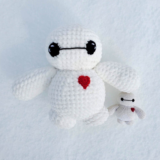 2 crocheted amigurumi Baymax stuffies
